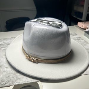 White cowboy hat with brown band